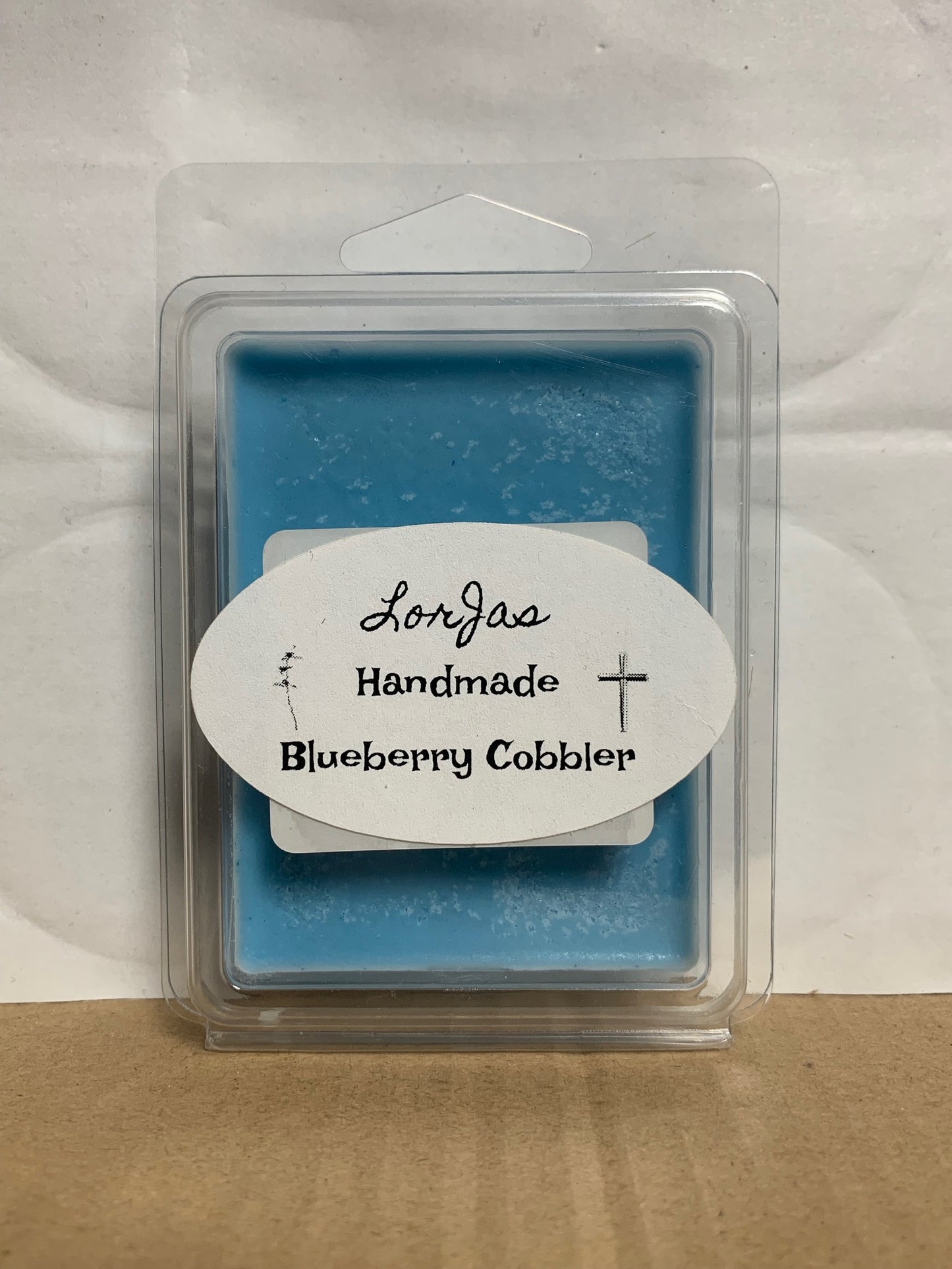 LorJas Handmade 'Blueberry Cobbler' scented organic soy wax melt in packaging with a label on a white and brown background