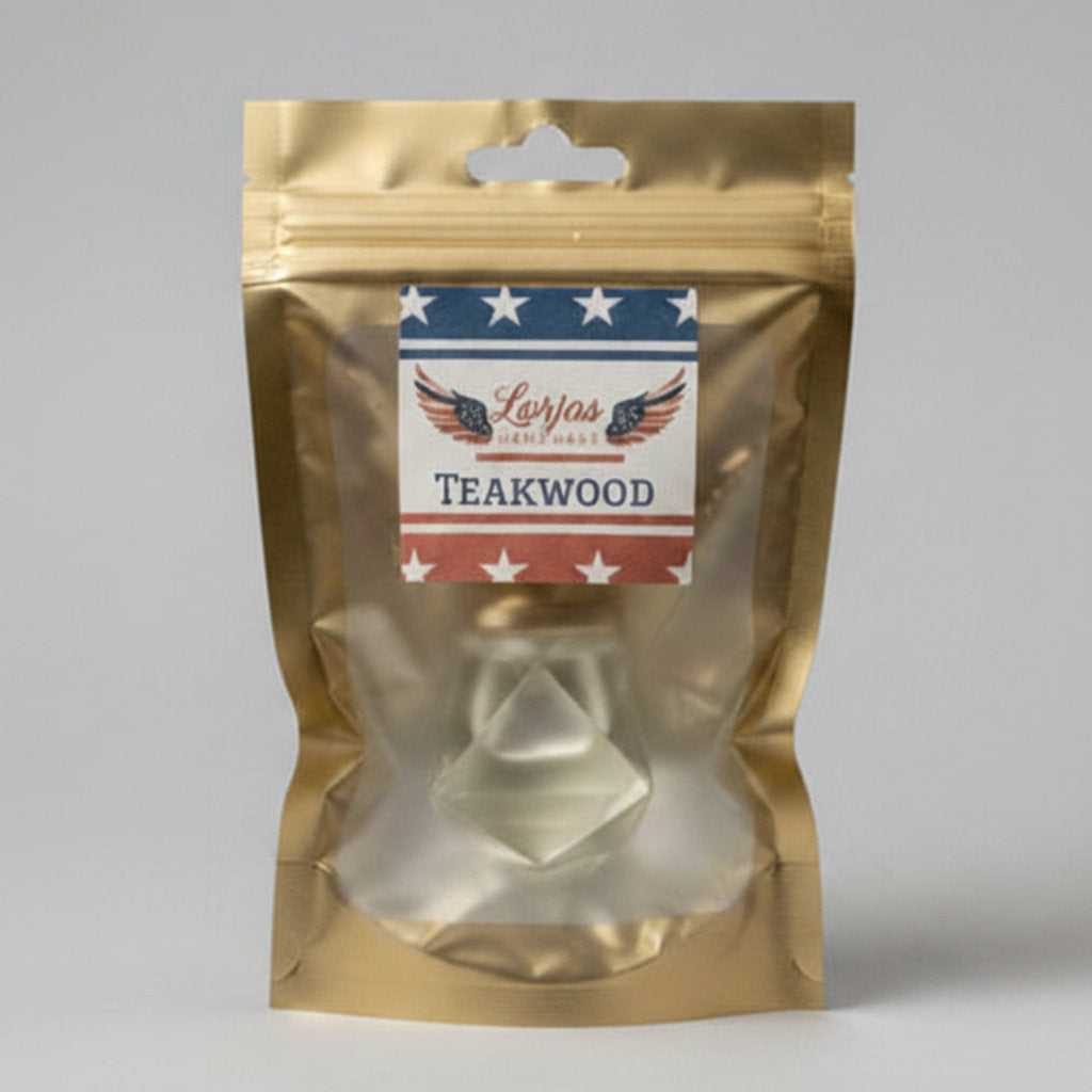 LorJas Handmade Teakwood lightly scented car diffuser in gold branded packaging in a studio setting.