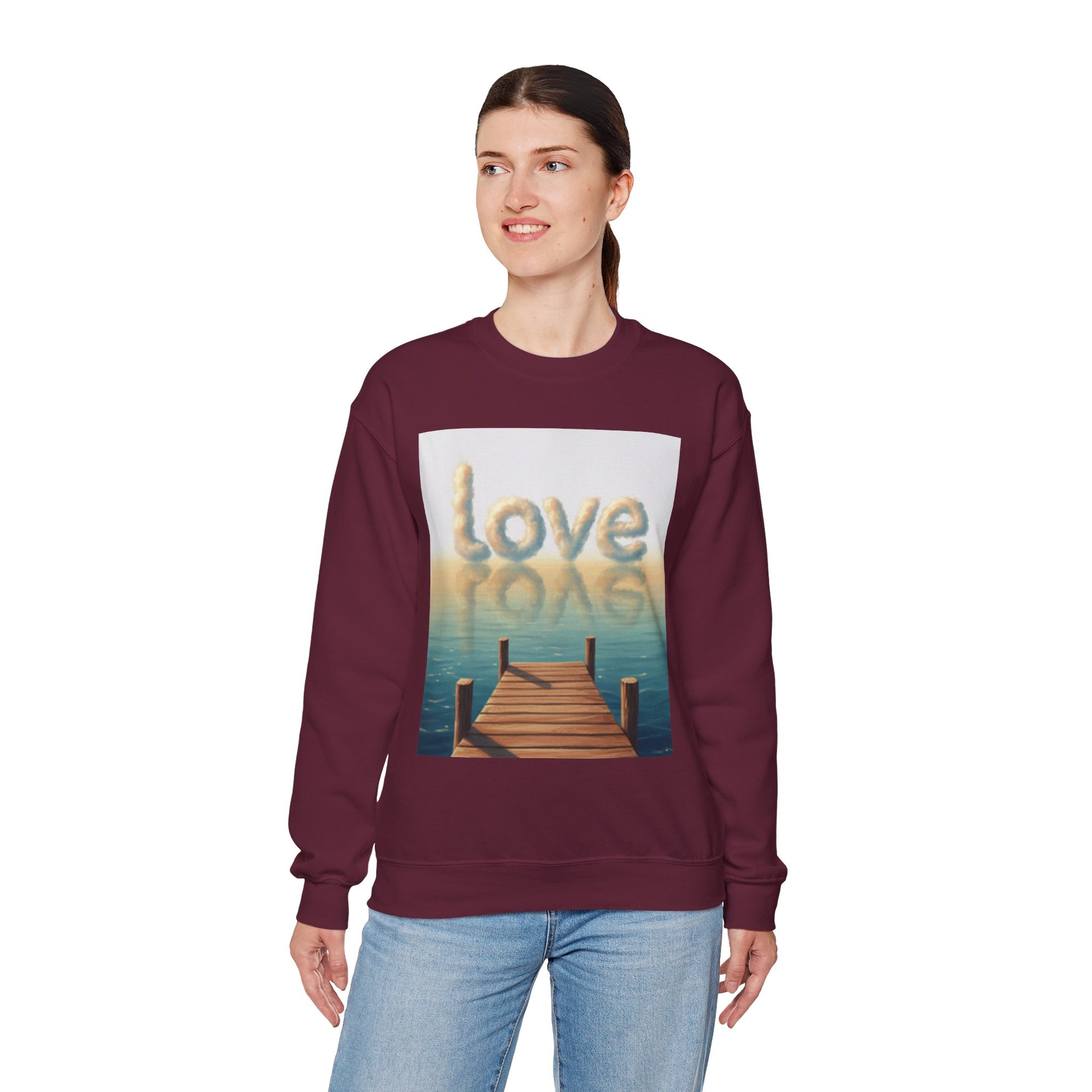 Woman wearing a maroon sweatshirt with a graphic design on a white background