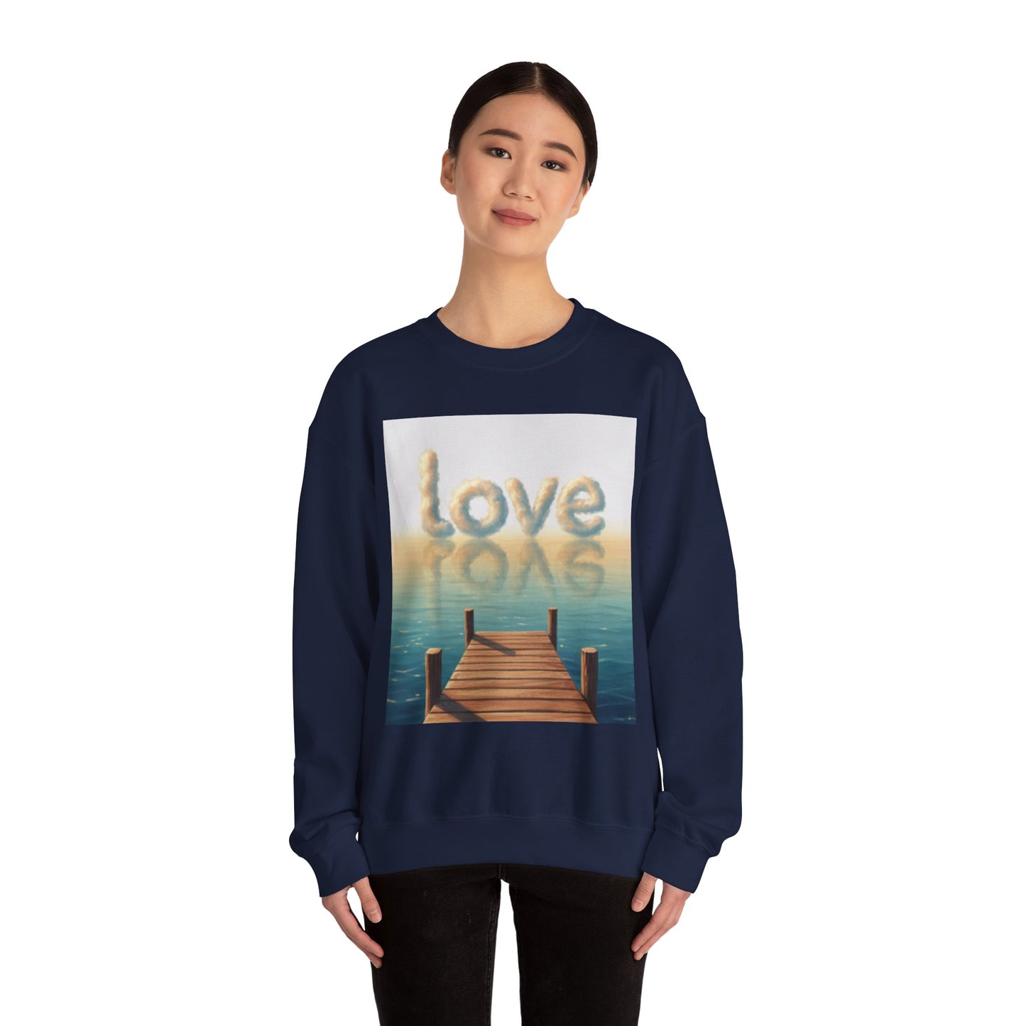 Person wearing a navy blue sweatshirt with a 'Love' graphic design on a white background
