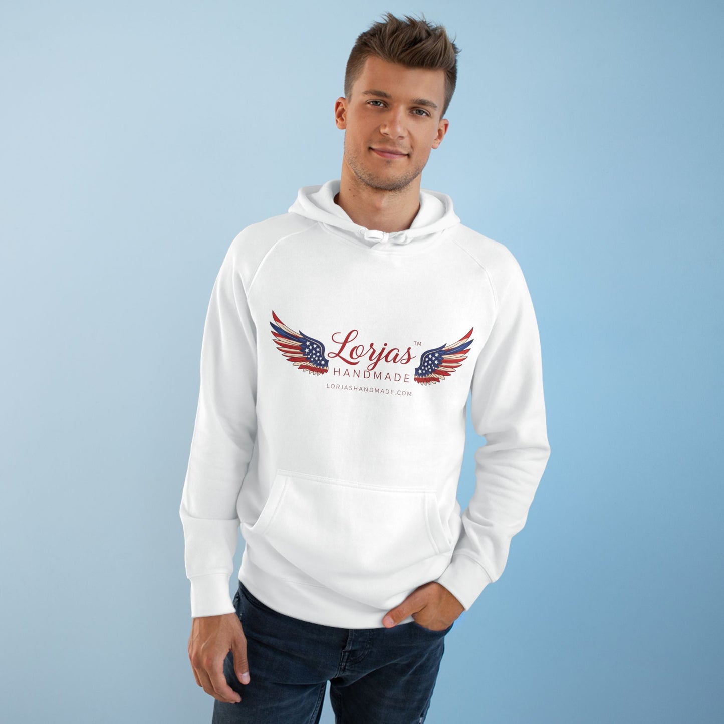 Man wearing a white hoodie with 'Lorjas Handmade' logo on a light blue background