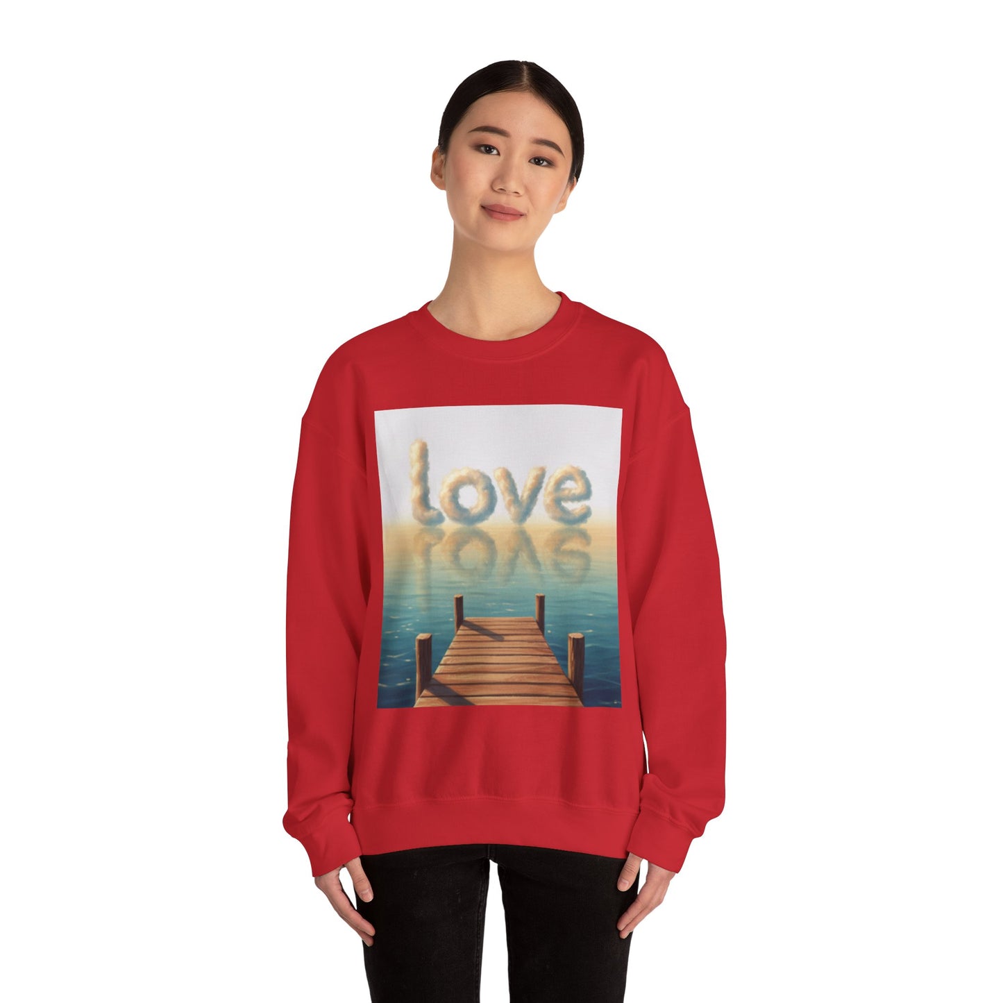 Person wearing a red sweatshirt with a scenic design and 'love' text on a white background