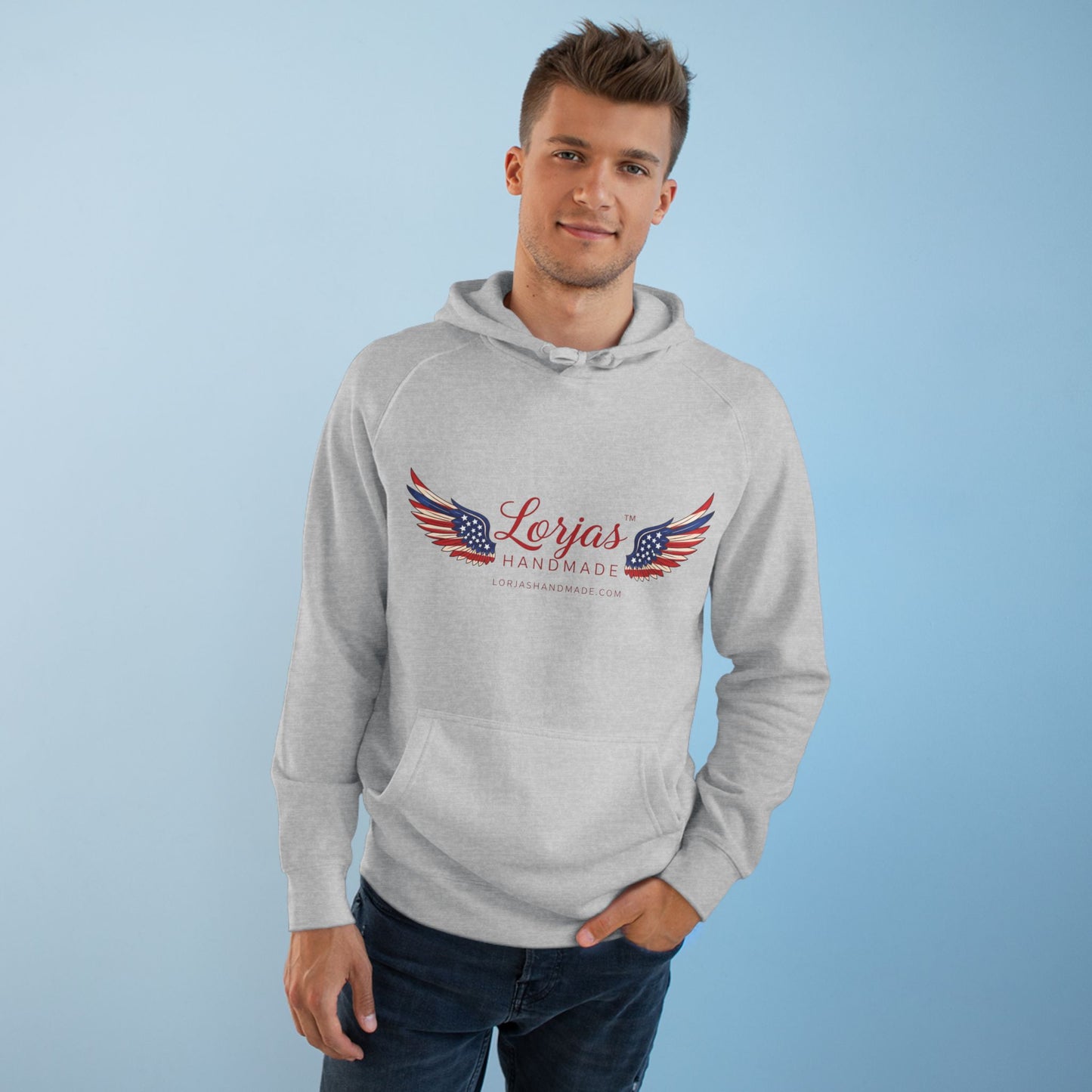 Man wearing a gray hoodie with a logo and text on a light blue background
