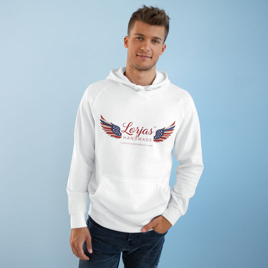 Young man wearing a white hoodie with Lorjas Handmade logo on a light blue background