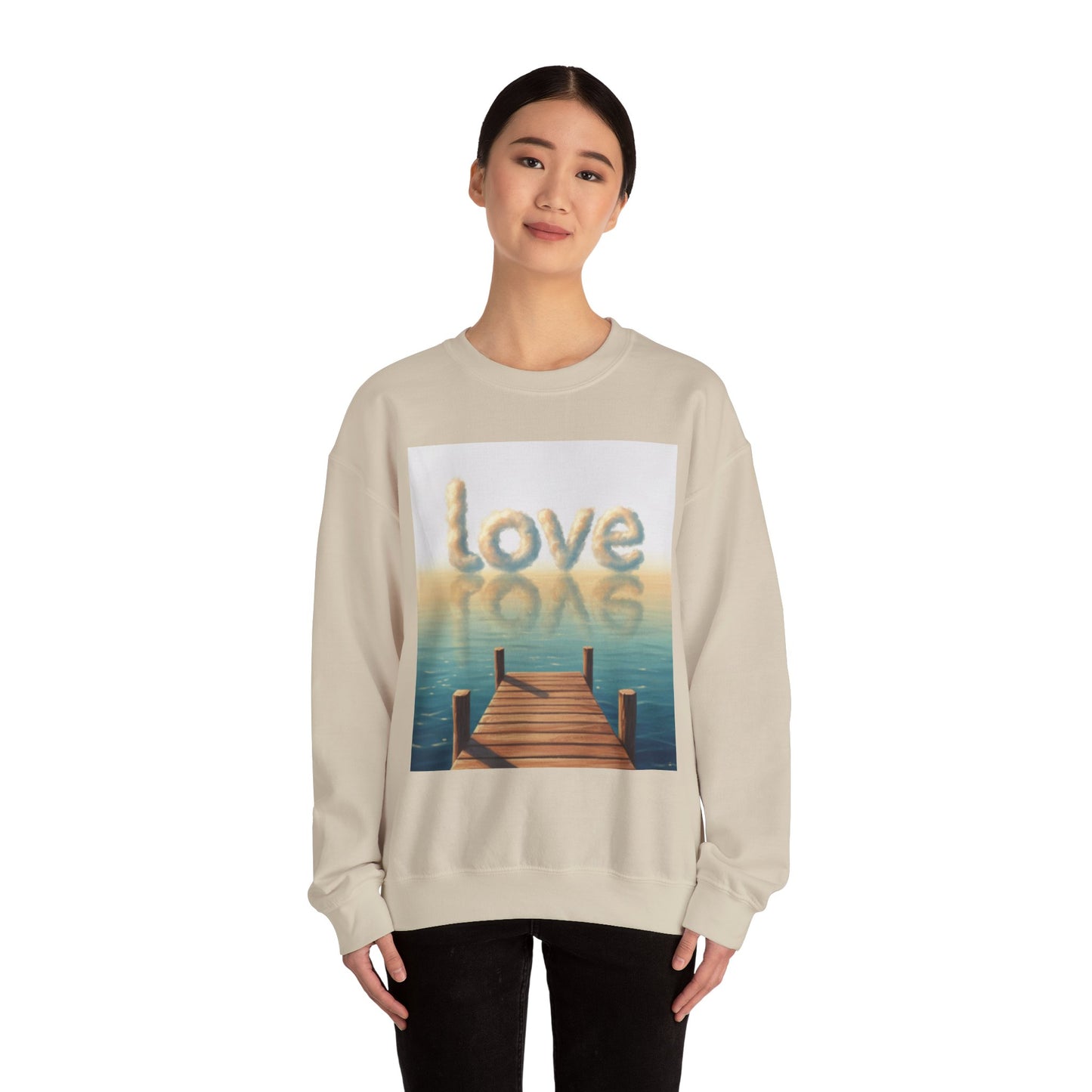Person wearing a beige sweatshirt with a 'love' graphic design on a white background