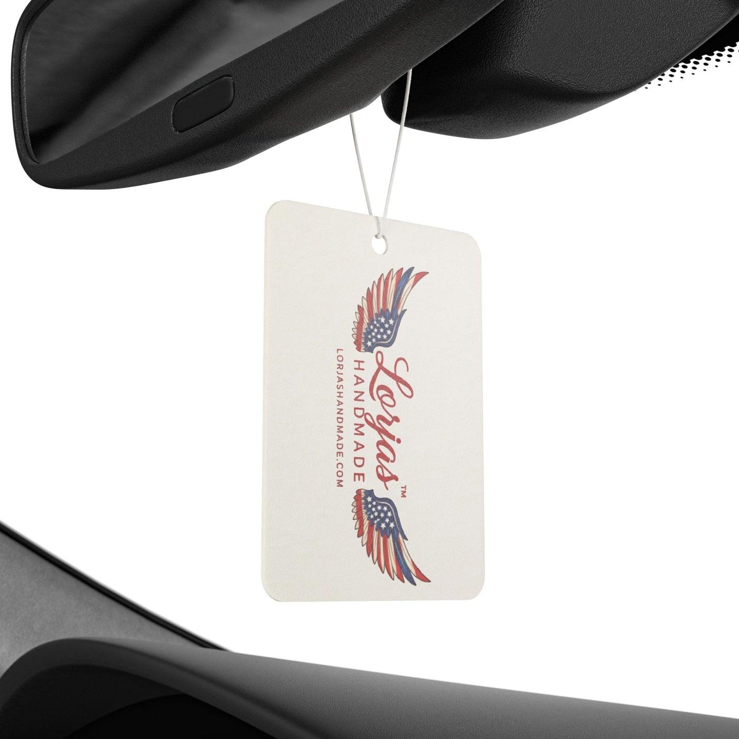 LorJas Handmade branded car air freshener hanging from a car's rearview mirror.