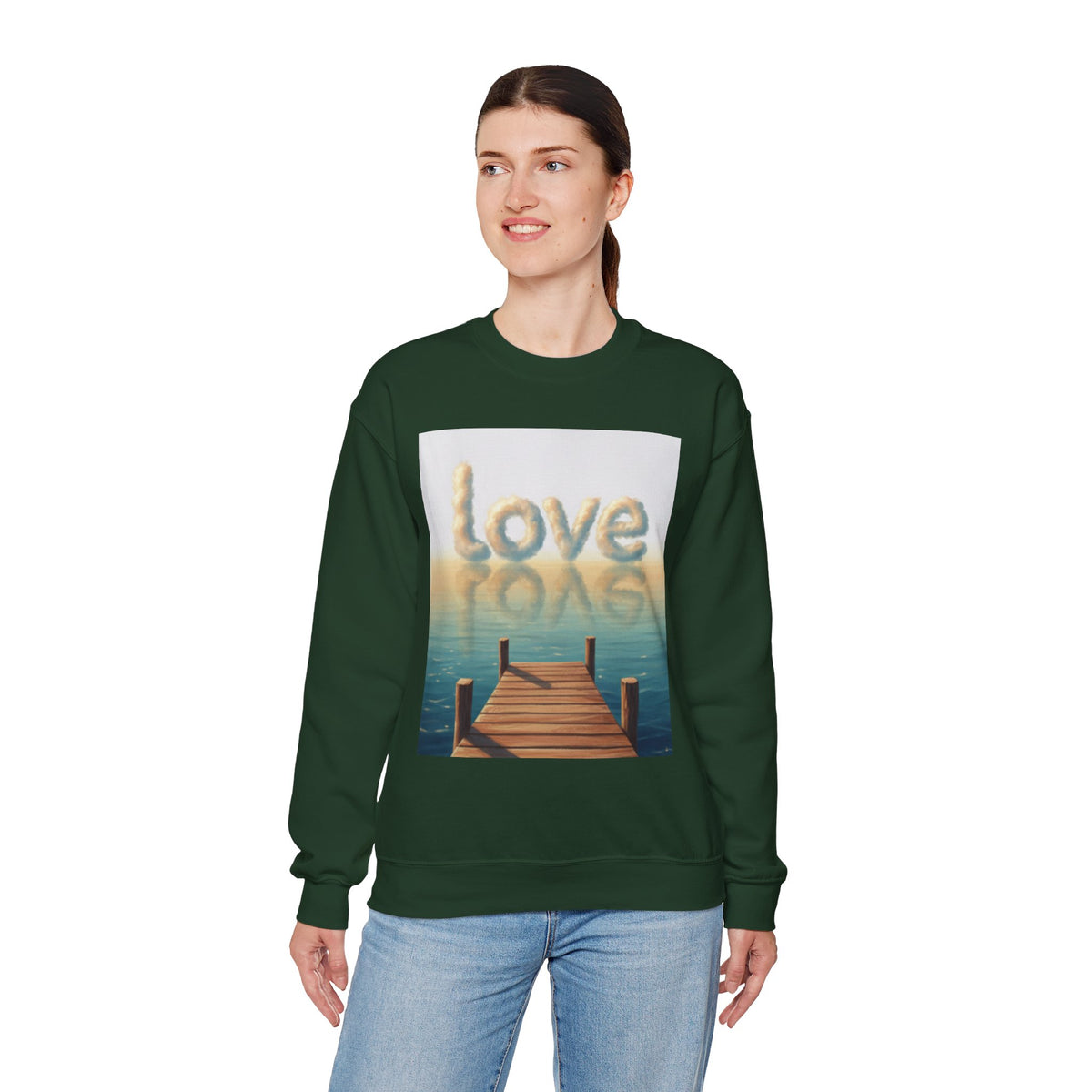 Person wearing a green sweatshirt with a 'love' graphic design on a white background
