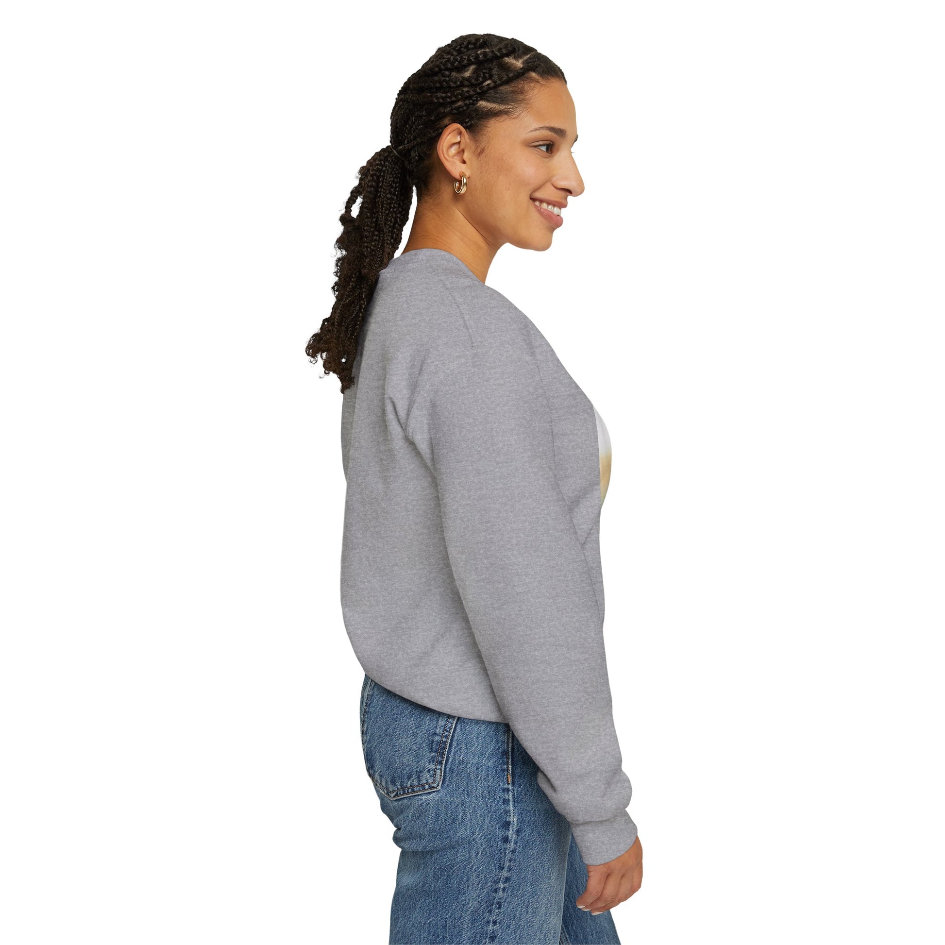 Woman wearing a gray sweatshirt with a graphic design on the front, standing against a white background.