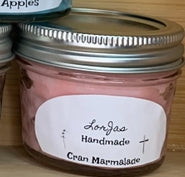 LorJas Handmade 'Cran Marmalade' scented organic soy candle with label with wooden background