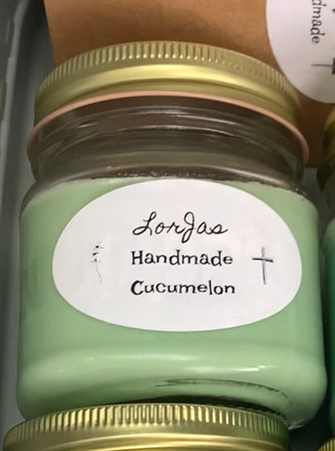 LorJas Handmade 'Cucumelon' scented organic soy candle on a grey background