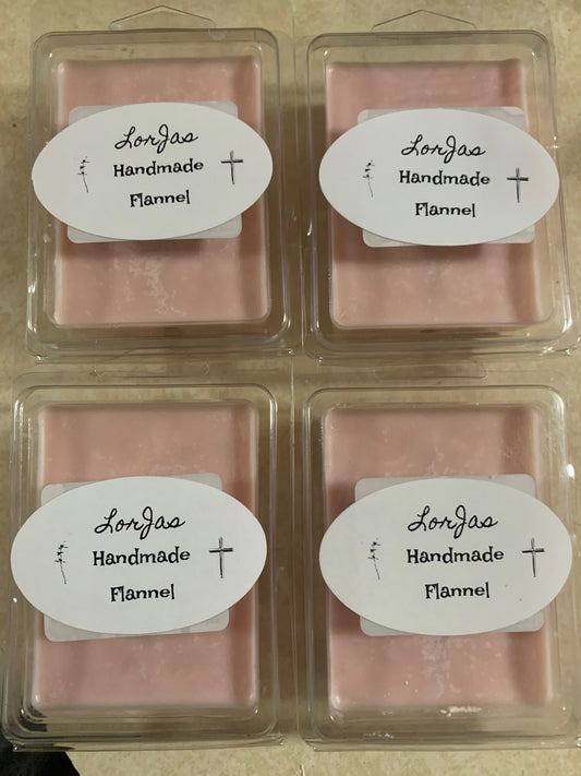 Four pink LorJas Handmade 'Flannel' scented organic soy wax melts in clear packaging on beige background.
