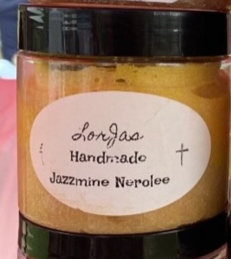 Jar of LorJas Handmade 'Jazzmine Nerolee' scented foamy whipped sugar scrub with a label on a colorful background