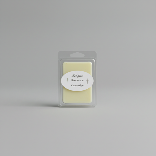 Lor’Jas Handmade 'Cucumelon' scented soy wax melt in brand packaging with studio backdrop.