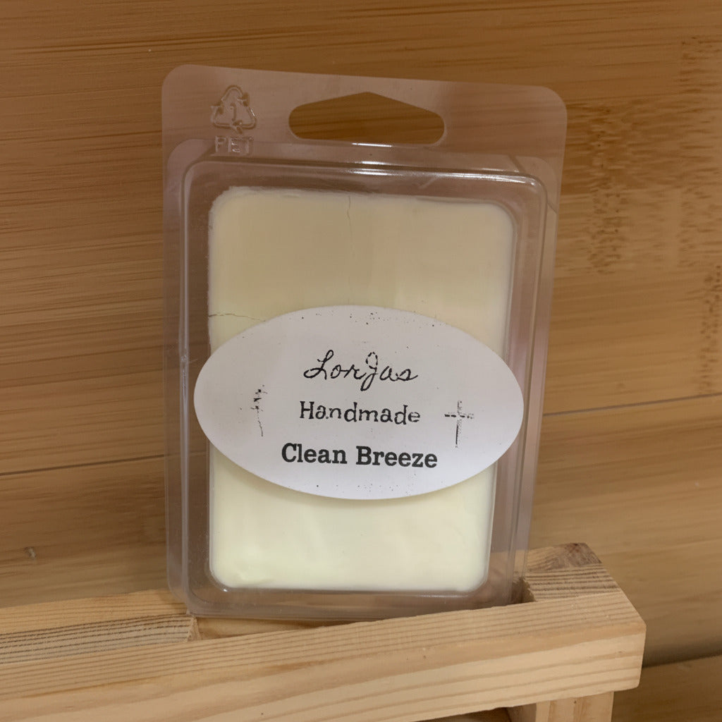 LorJas Handmade Clean Breeze lightly scented organic soy wax melt in clear packaging with a label on a wooden surface