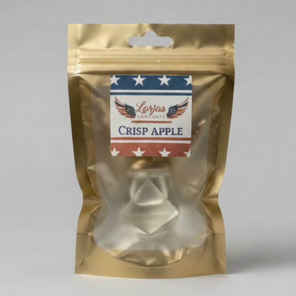 LorJas Handmade Crisp Apple lightly scented car diffuser in gold branded packaging in a studio setting.