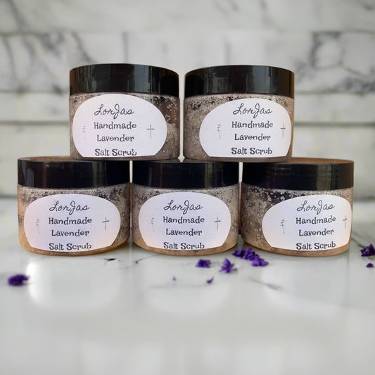 LorJas Handmade Lavender lightly scented salt scrub on marble counter with blurred background in natural light.