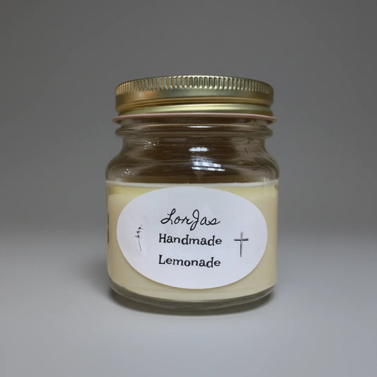 LorJas Handmade Lemonade lightly scented soy candle with a light grey studio background.