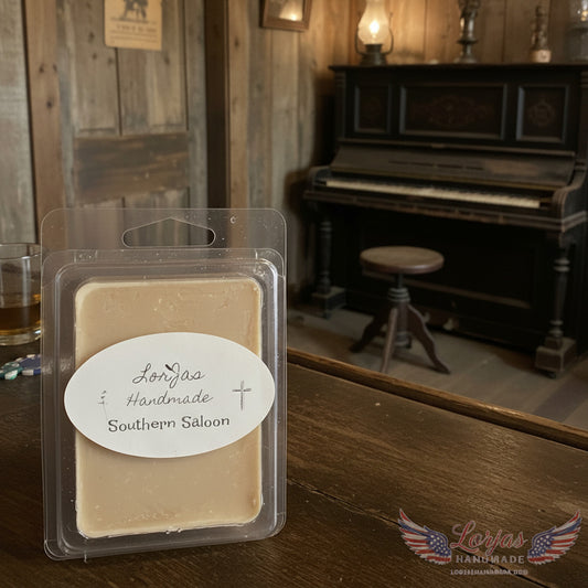 LorJas Handmade Southern Saloon lightly scented soy wax melt on a rustic wooden bar in an old saloon setting with a piano and stool in the background.