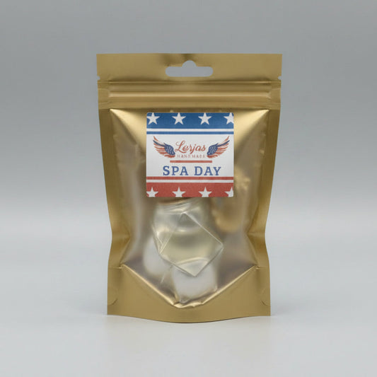 LorJas Handmade Spa Day lightly scented car diffuser in gold branded packaging in a studio setting.