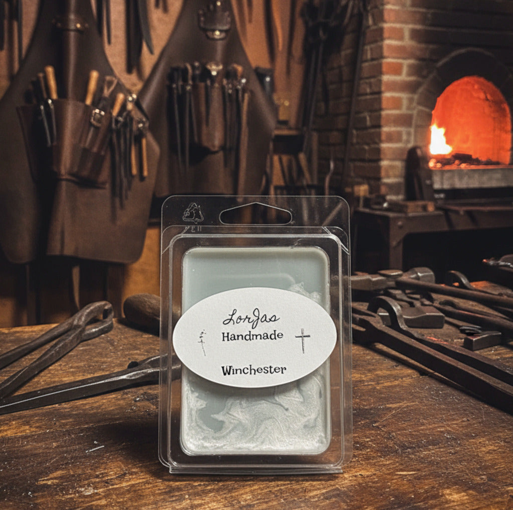 LorJas Handmade Winchester lightly scented soy melt on a rustic wooden surface in a blacksmith setting.
