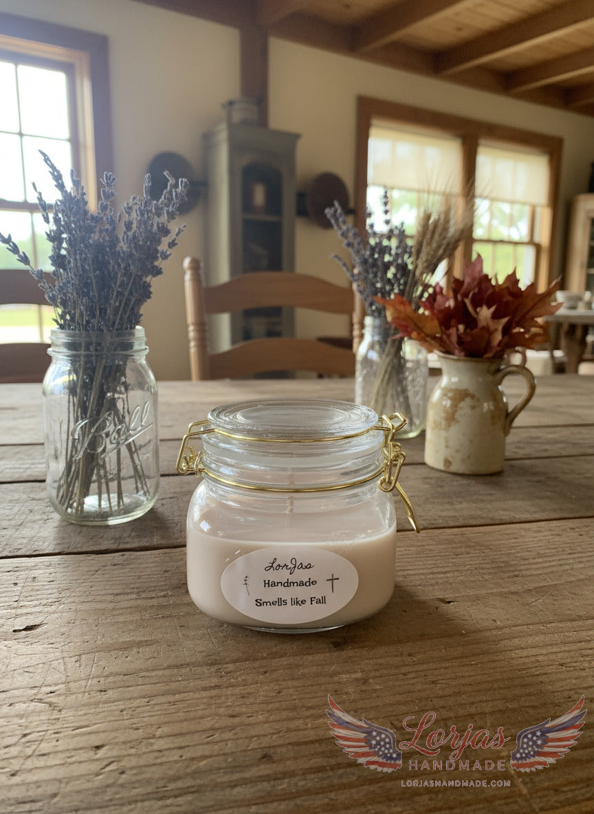 Packaged wax melt 'LorJas Handmade Smells like Fall' label on a wooden surface with pumpkins, corn, and folded cloths in the background