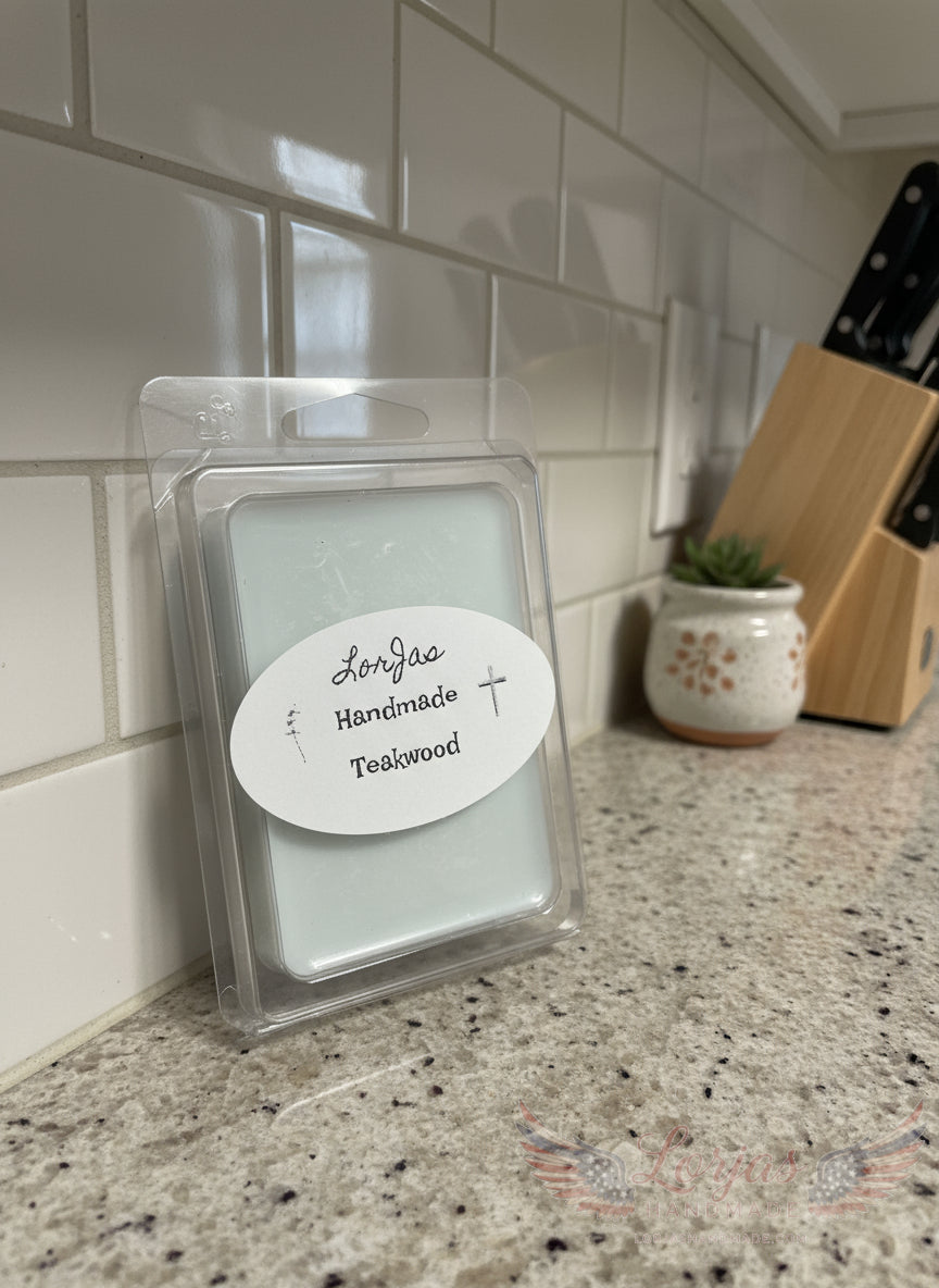 Packaged LorJas Handmade 'Teakwood' wax melt with a label on a kitchen counter