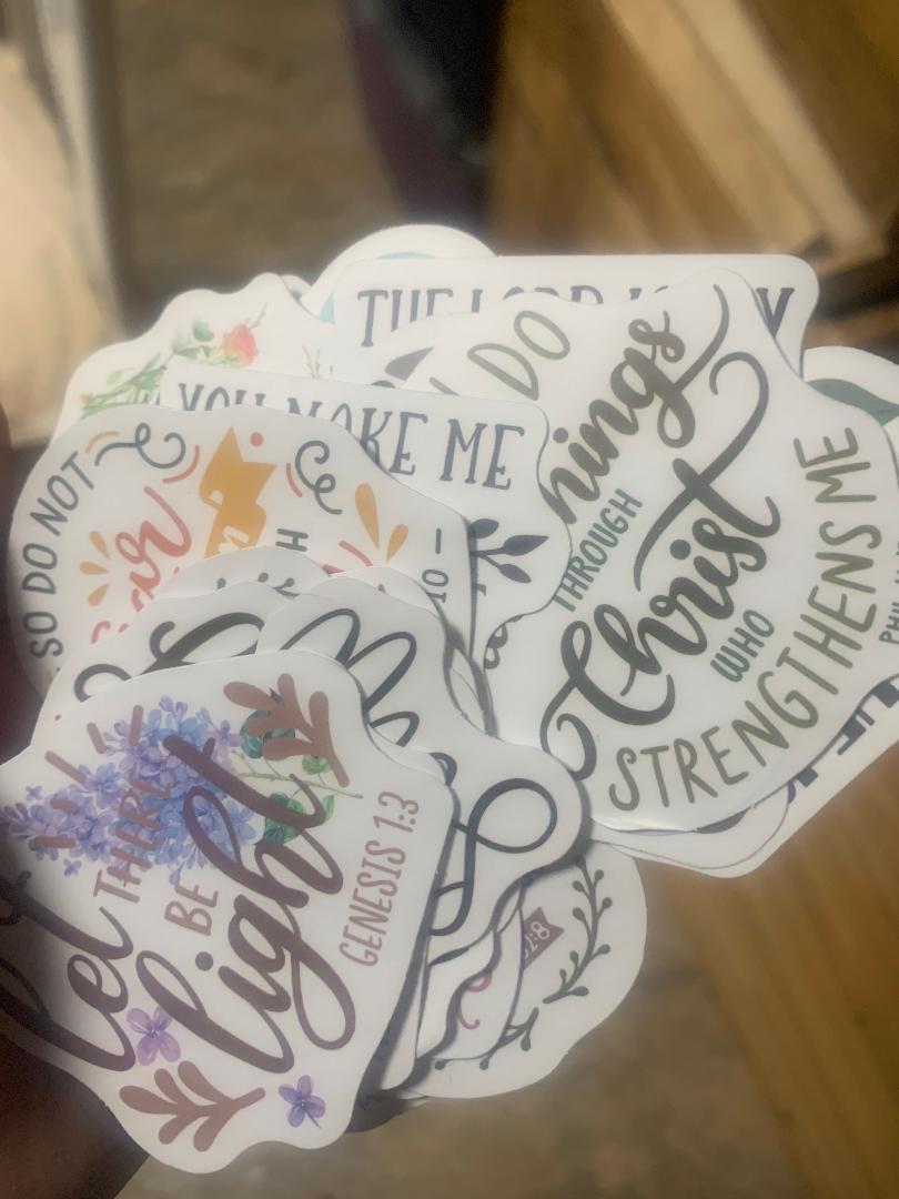 Set of LorJas Handmade motivational stickers with inspirational scripture quotes on a wooden surface
